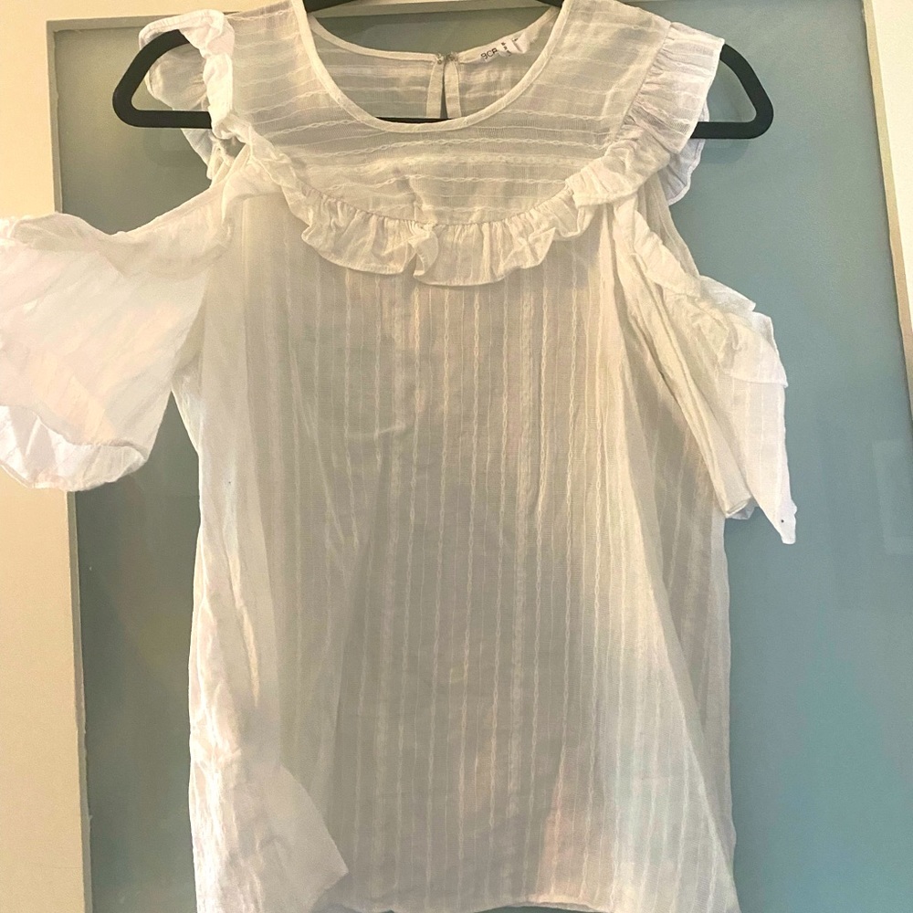 BCBG white blouse with cut out shoulders